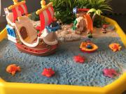 1R-pirate-small-world-treasure-ship-sand-1